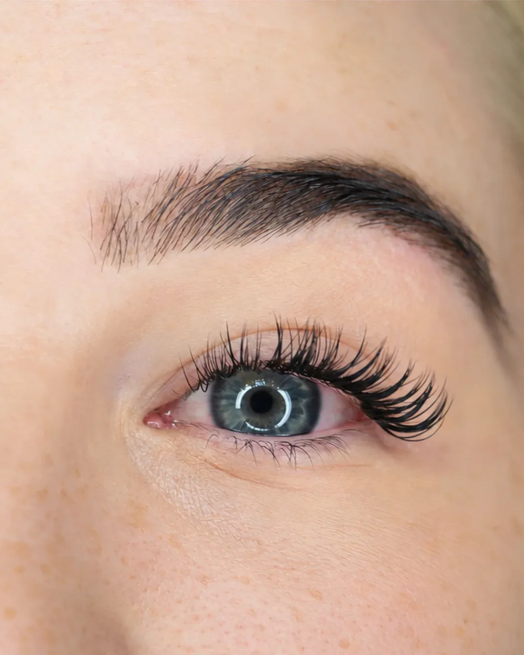 Client&rsquo;s brow and lashes, after shape, tint and lash extensions at Benito